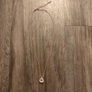 Rose gold necklace.